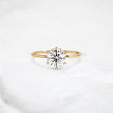 blossom-shine-round-pear-accents-moissanite-solitaire-ring-1-20-ct-yellow-gold-gemfora-1